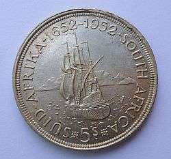 A TRI-CENTENARY 5 SHILLING COIN - 50% SILVER AND IN GOOD CONDITION