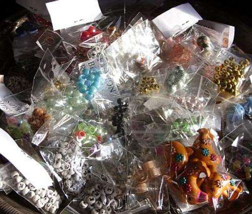 100 PACKETS OF BEADS - NEW OLD STOCK - CRISP IN PACKETS - BID PER PACK