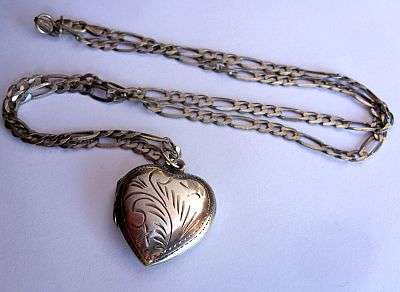 A FABULOUS SOLID STERLING SILVER NECKLACE BY FABIOS WITH A LARGE HEART SHAPED LOCKET !!!! AWESOME !!