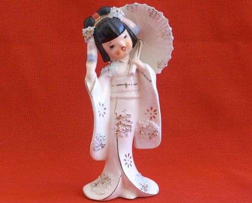 A HIGHLY DETAILED PORCELAIN ORNAMENT OF A JAPANESE GIRL WITH HER UMBRELLA ...SO CUTE !!