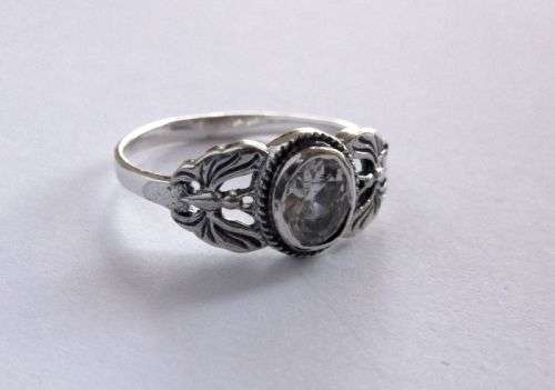 A GREAT QUALITY SOLID STERLING SILVER RING WITH BUTTERFLY MOTIF AND FACETED CLEAR STONE...AWESOME !!