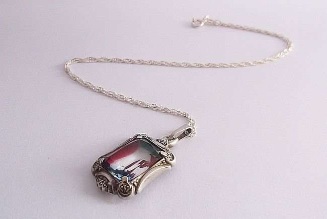 A BRAND NEW STERLING SILVER NECKLACE WITH A GORGEOUS VINTAGE GERMAN SILVER PENDANT..UNUSUAL FIND !!