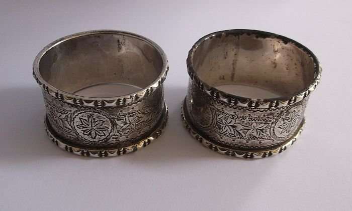 A MARVELOUS SOLID STERLING SILVER PAIR OF NAPKIN RINGS ...RARE 19TH CENTURY PIECES...GOOD WEIGHT !!