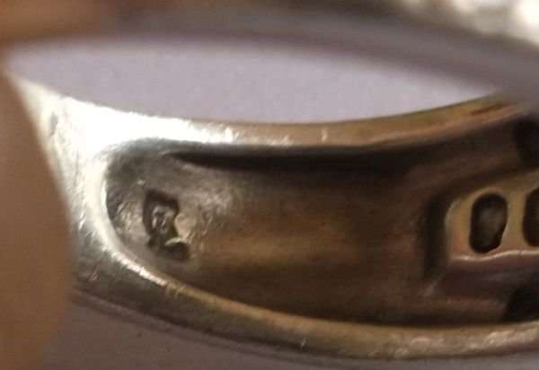 A GORGEOUS SOLID STERLING SILVER RING SET WITH VARIOUS FACETED STONES...MADE FOR AMERICAN SWISS !!!