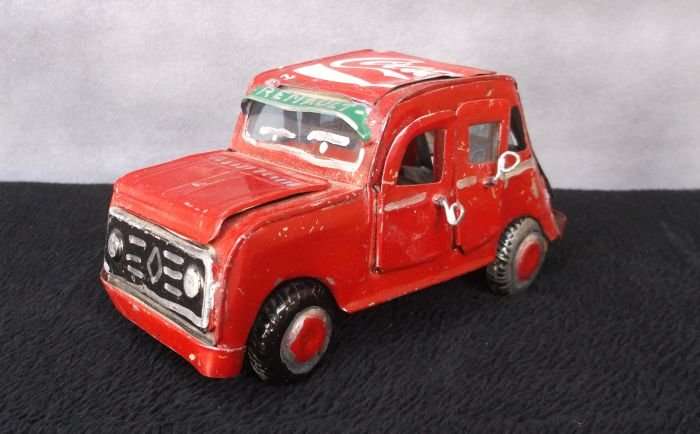 A VINTAGE HAND MADE TIN METAL CAR ORNAMENT ...OPENING DOORS AND BONNET ...AFRICAN ART
