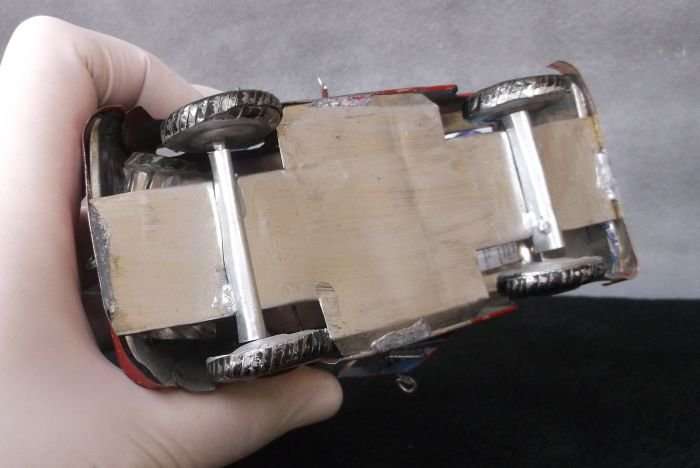 A VINTAGE HAND MADE TIN METAL CAR ORNAMENT ...OPENING DOORS AND BONNET ...AFRICAN ART