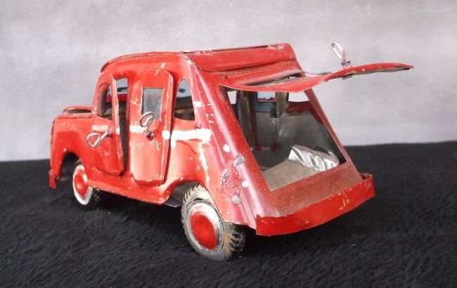 A VINTAGE HAND MADE TIN METAL CAR ORNAMENT ...OPENING DOORS AND BONNET ...AFRICAN ART