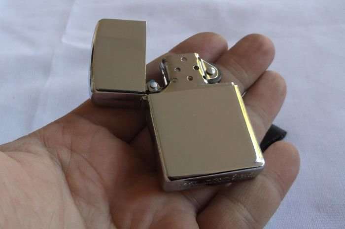 AN AWESOME ZIPPO LOOK WIND PROOF LIGHTER PLUS GENUINE LEATHER POUCH ...NEW OLD STOCK !!