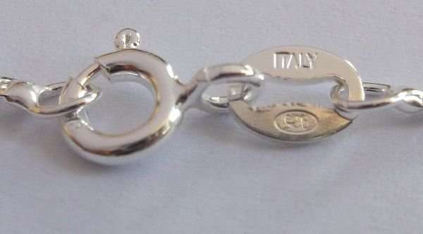 WOW !!!! A STERLING SILVER NECKLACE WITH A STERLING SILVER CROSS PENDANT ...RED INSET