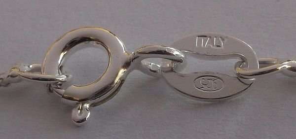 A STERLING SILVER NECKLACE PLUS A STERLING SILVER PENDANT SET WITH A CLEAR FACETED STONE