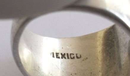 A HEAVY WIDE SOLID MEXICAN STERLING SILVER RING ....WOW FACTOR....WOW QUALITY !!!