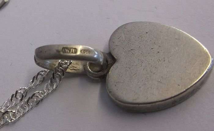 A QUALITY STERLING SILVER BRACELET..STERLING SILVER EARRINGS...STERLING SILVER NECKLACE AND PENDANT