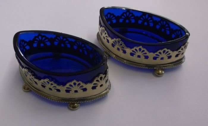 A PAIR OF GORGEOUSLY DESIGNED VICTORIAN ERA OPEN SALTS WITH ORIGINAL BLUE GLASS LINERS