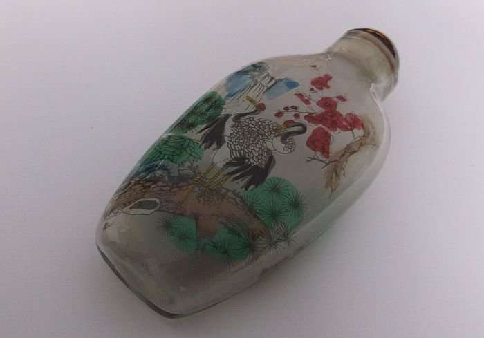 A BEAUTIFUL ORIENTAL GLASS SNUFF BOTTLE WITH WILD BIRD , WATERFALL AND BLOSSOMS DETAIL ....WOW !!