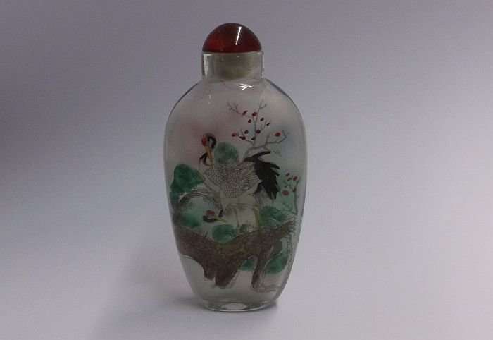 A BEAUTIFUL ORIENTAL GLASS SNUFF BOTTLE WITH WILD BIRD , WATERFALL AND BLOSSOMS DETAIL ....WOW !!