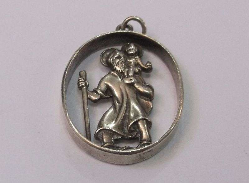 A LARGE VINTAGE SOLID SILVER ST CHRISTOPHER PENDANT