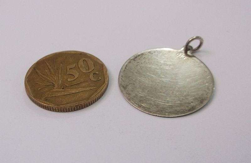 A SOLID STERLING SILVER DISC PENDANT ...FOR ENGRAVING A DEDICATION