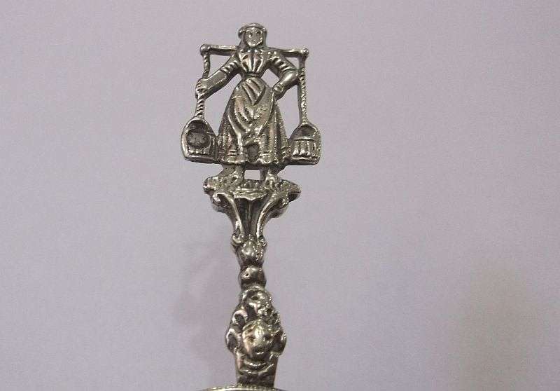 An old solid Dutch silver tea strainer with beautiful detail and applicable stamps