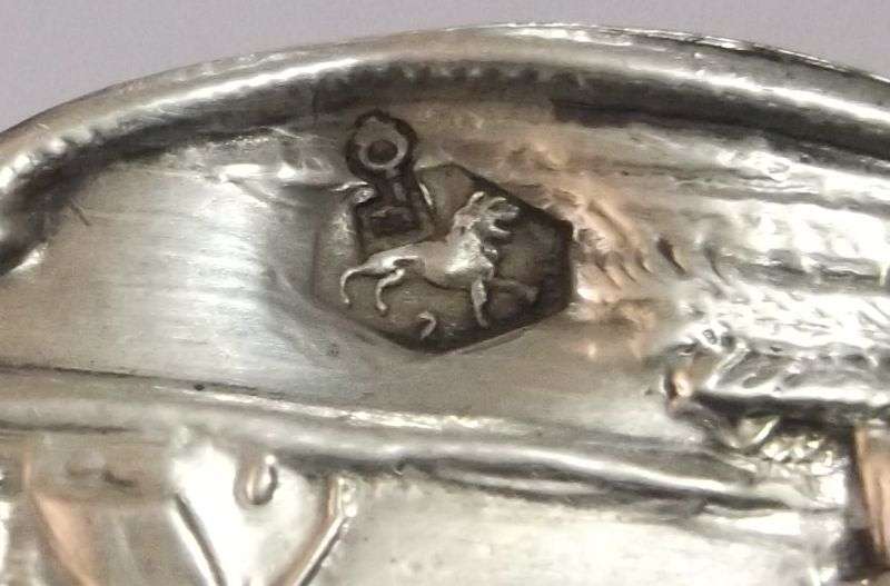 An old solid Dutch silver tea strainer with beautiful detail and applicable stamps