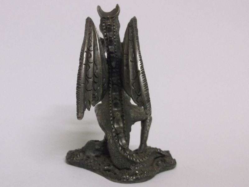 A fabulous Pewter statue entitled " THE DRAGON OF THE MOON " with crystal ball...AWESOME !!