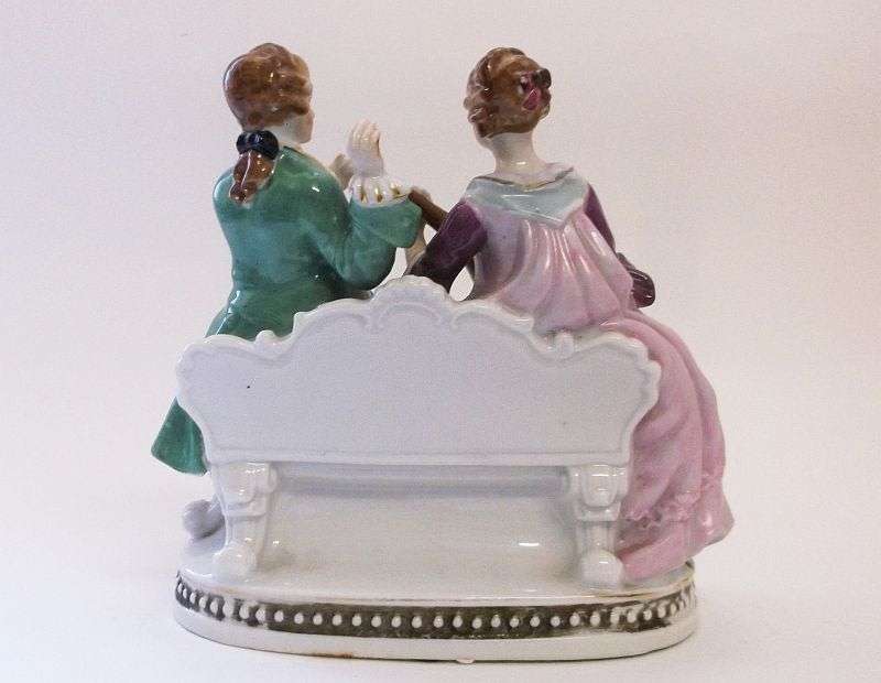 HIGHLY COLLECTABLE !! A VICTORIAN STYLED ORNAMENT OF A LADY AND GENTLEMAN ...OCCUPIED JAPAN...WOW !!