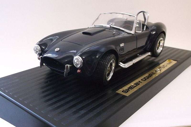 A DETAILED DIE CAST METAL 1:18 SCALE MODEL OF THE ""AWESOME"" 1964 SHELBY COBRA 427 S/C....WOW !!!!