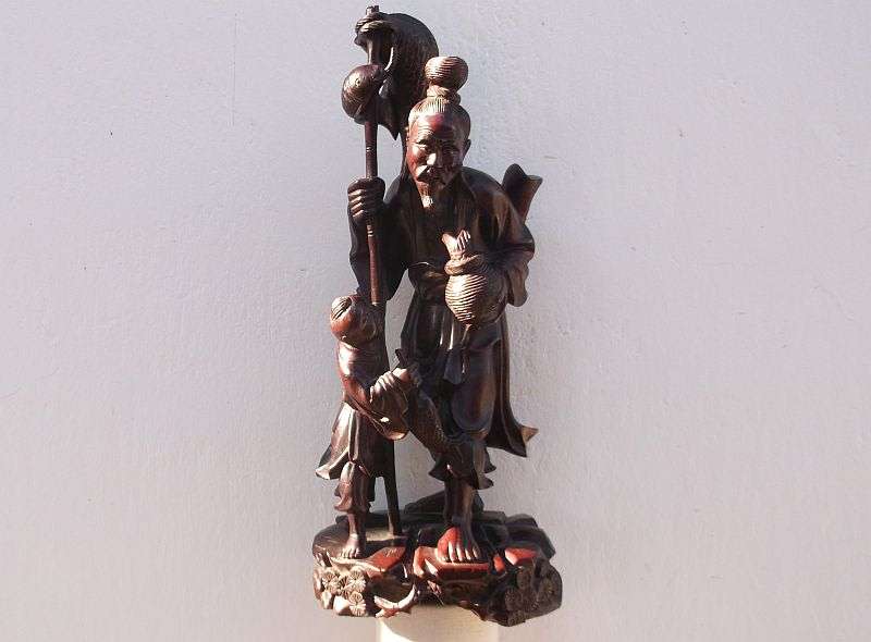 A RARE ORIENTAL ANTIQUE HAND CARVED WOODEN STATUE OF A FISHERMAN WITH HIS APPRENTICE ...AWESOME !!!!
