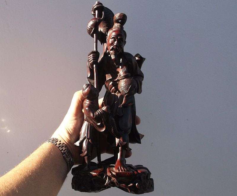 A RARE ORIENTAL ANTIQUE HAND CARVED WOODEN STATUE OF A FISHERMAN WITH HIS APPRENTICE ...AWESOME !!!!