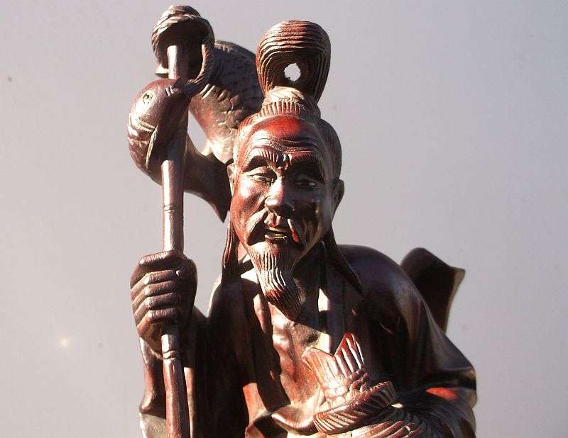 A RARE ORIENTAL ANTIQUE HAND CARVED WOODEN STATUE OF A FISHERMAN WITH HIS APPRENTICE ...AWESOME !!!!