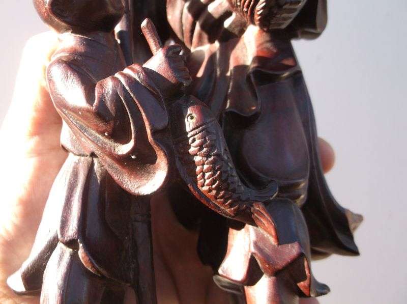 A RARE ORIENTAL ANTIQUE HAND CARVED WOODEN STATUE OF A FISHERMAN WITH HIS APPRENTICE ...AWESOME !!!!