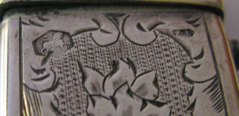 WHAT A FIND AND A PITY ....AN ANTIQUE SOLID DUTCH SILVER VESTA CASE WITH LOVELY DETAIL...HINGE ISSUE