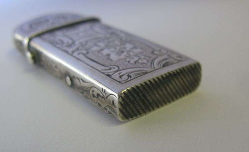 WHAT A FIND AND A PITY ....AN ANTIQUE SOLID DUTCH SILVER VESTA CASE WITH LOVELY DETAIL...HINGE ISSUE