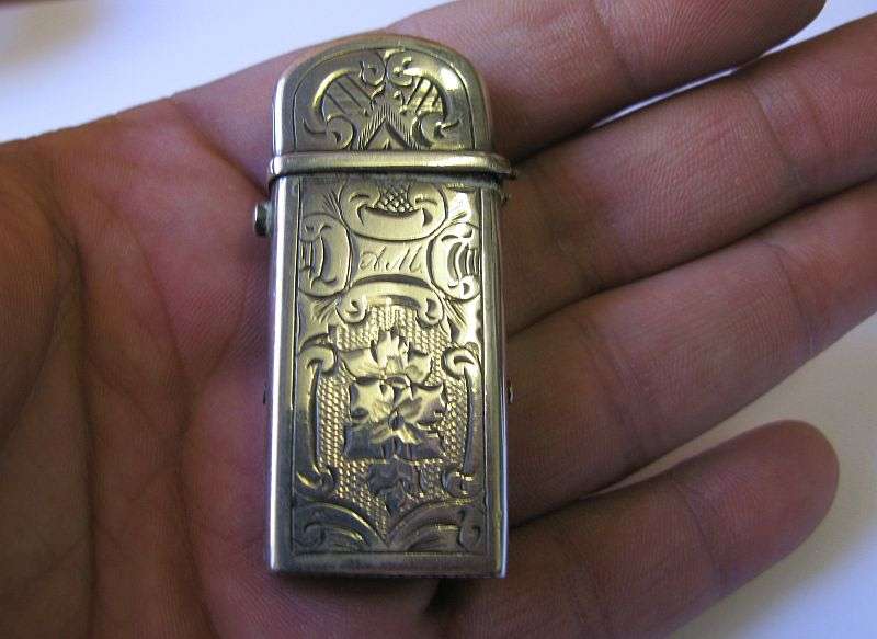 WHAT A FIND AND A PITY ....AN ANTIQUE SOLID DUTCH SILVER VESTA CASE WITH LOVELY DETAIL...HINGE ISSUE