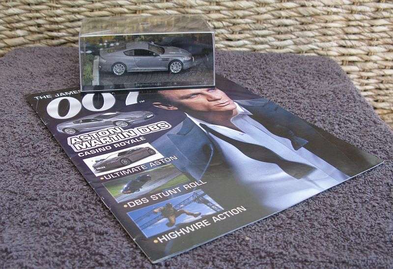 A 1:43 SCALE DIE CAST METAL MODEL OF THE ASTON MARTIN DBS AS SEEN IN THE JAMES BOND MOVIE