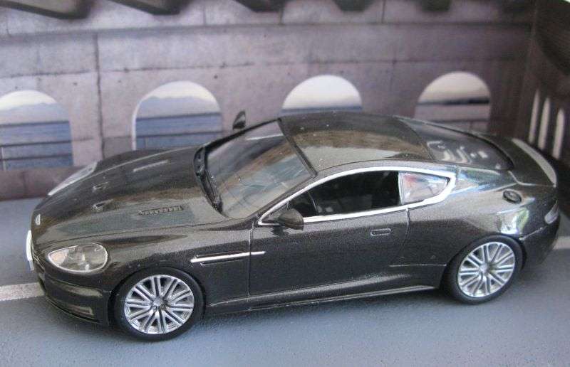 A 1:43 SCALE DIE CAST METAL MODEL OF THE ""ASTON MARTIN DBS"" AS SEEN IN THE JAMES BOND MOVIE