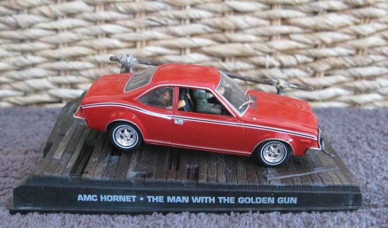 A 1:43 SCALE DIE CAST METAL MODEL OF THE ""AMC HORNET"" AS SEEN IN THE JAMES BOND MOVIE