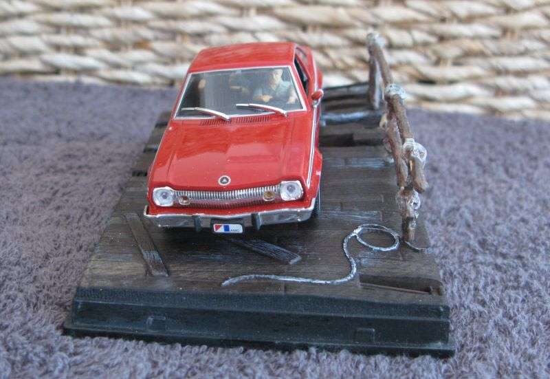 A 1:43 SCALE DIE CAST METAL MODEL OF THE ""AMC HORNET"" AS SEEN IN THE JAMES BOND MOVIE