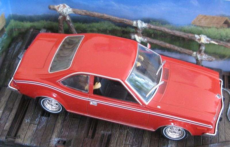 A 1:43 SCALE DIE CAST METAL MODEL OF THE ""AMC HORNET"" AS SEEN IN THE JAMES BOND MOVIE