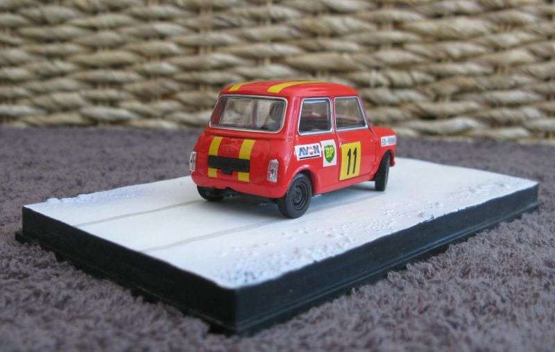 A 1:43 SCALE DIE CAST METAL MODEL OF THE ""AUSTIN MINI"" AS SEEN IN THE JAMES BOND MOVIE