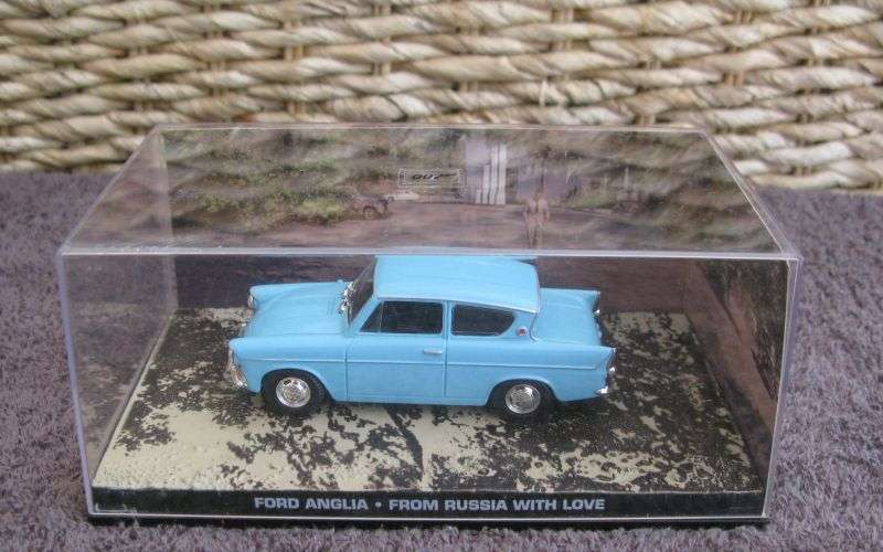 A 1:43 SCALE DIE CAST METAL MODEL OF THE ""FORD ANGLIA"" AS SEEN IN THE JAMES BOND MOVIE