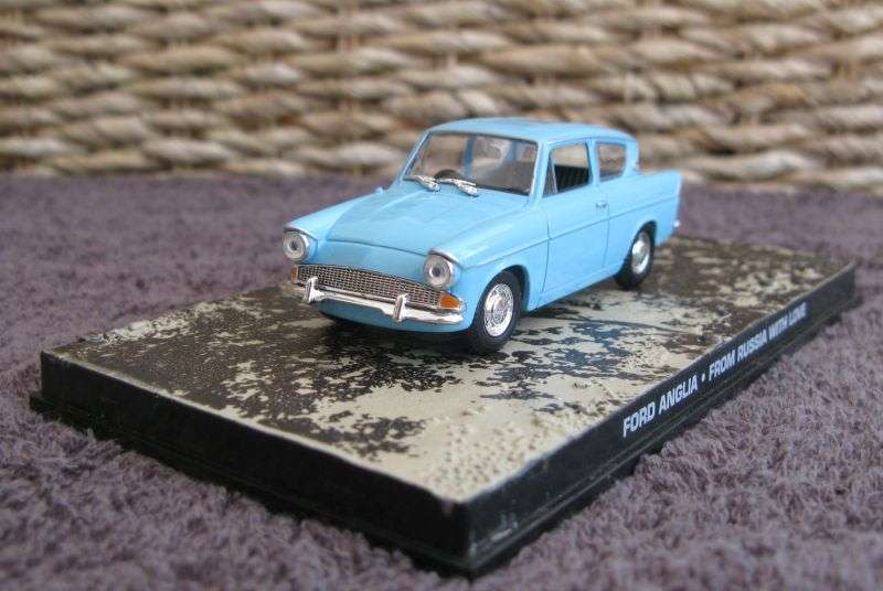 A 1:43 SCALE DIE CAST METAL MODEL OF THE ""FORD ANGLIA"" AS SEEN IN THE JAMES BOND MOVIE