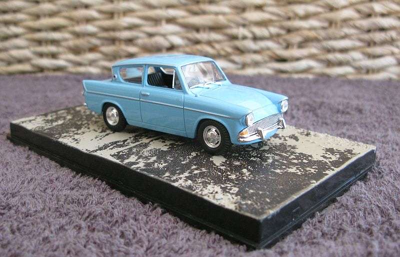 A 1:43 SCALE DIE CAST METAL MODEL OF THE ""FORD ANGLIA"" AS SEEN IN THE JAMES BOND MOVIE