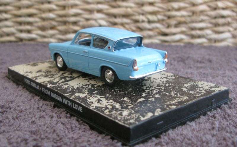 A 1:43 SCALE DIE CAST METAL MODEL OF THE ""FORD ANGLIA"" AS SEEN IN THE JAMES BOND MOVIE