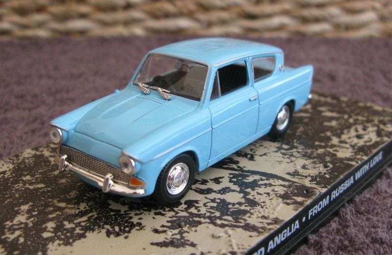 A 1:43 SCALE DIE CAST METAL MODEL OF THE ""FORD ANGLIA"" AS SEEN IN THE JAMES BOND MOVIE