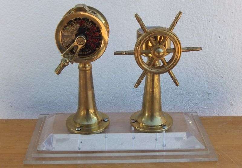 A STUNNING NAUTICAL BRASS ORNAMENTAL SHIPS TELEGRAPH , WHEEL , BELL AND COMPASS ...RARE FIND !!