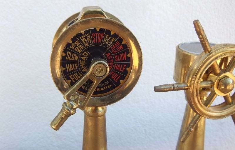 A STUNNING NAUTICAL BRASS ORNAMENTAL SHIPS TELEGRAPH , WHEEL , BELL AND COMPASS ...RARE FIND !!