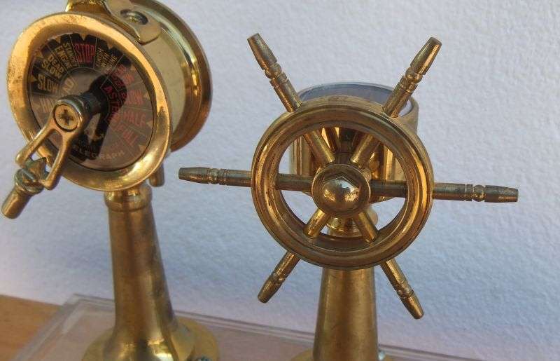 A STUNNING NAUTICAL BRASS ORNAMENTAL SHIPS TELEGRAPH , WHEEL , BELL AND COMPASS ...RARE FIND !!
