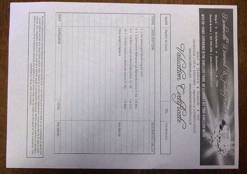 A MAGNIFICENT SOLID 9 CT GOLD RING SET WITH OVER A CARAT OF DIAMONDS !! CERTIFIED R 30 000 VALUE !!