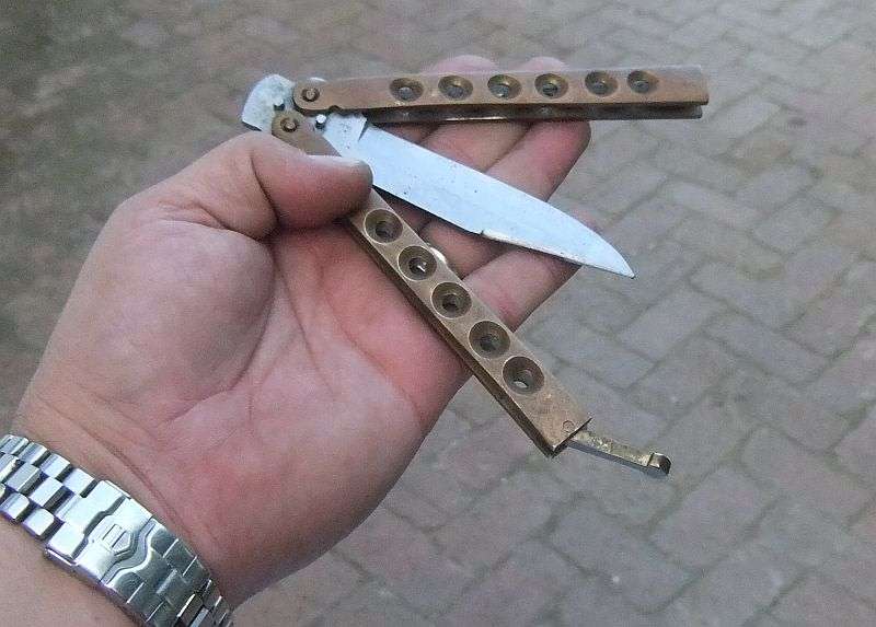 A COLLECTION OF SHARP OBJECTS...THROWING KNIFE ..BUTTERFLY KNIFE...DAGGER...RODGERS...ALL HERE !!!!