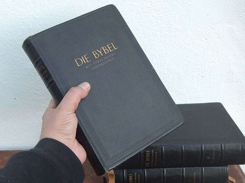 AN IMPRESSIVE 3 VOLUME SET OF THE BIBLE IN AFRIKAANS PRINTED IN THE NETHERLANDS DURING THE LATE 50`S